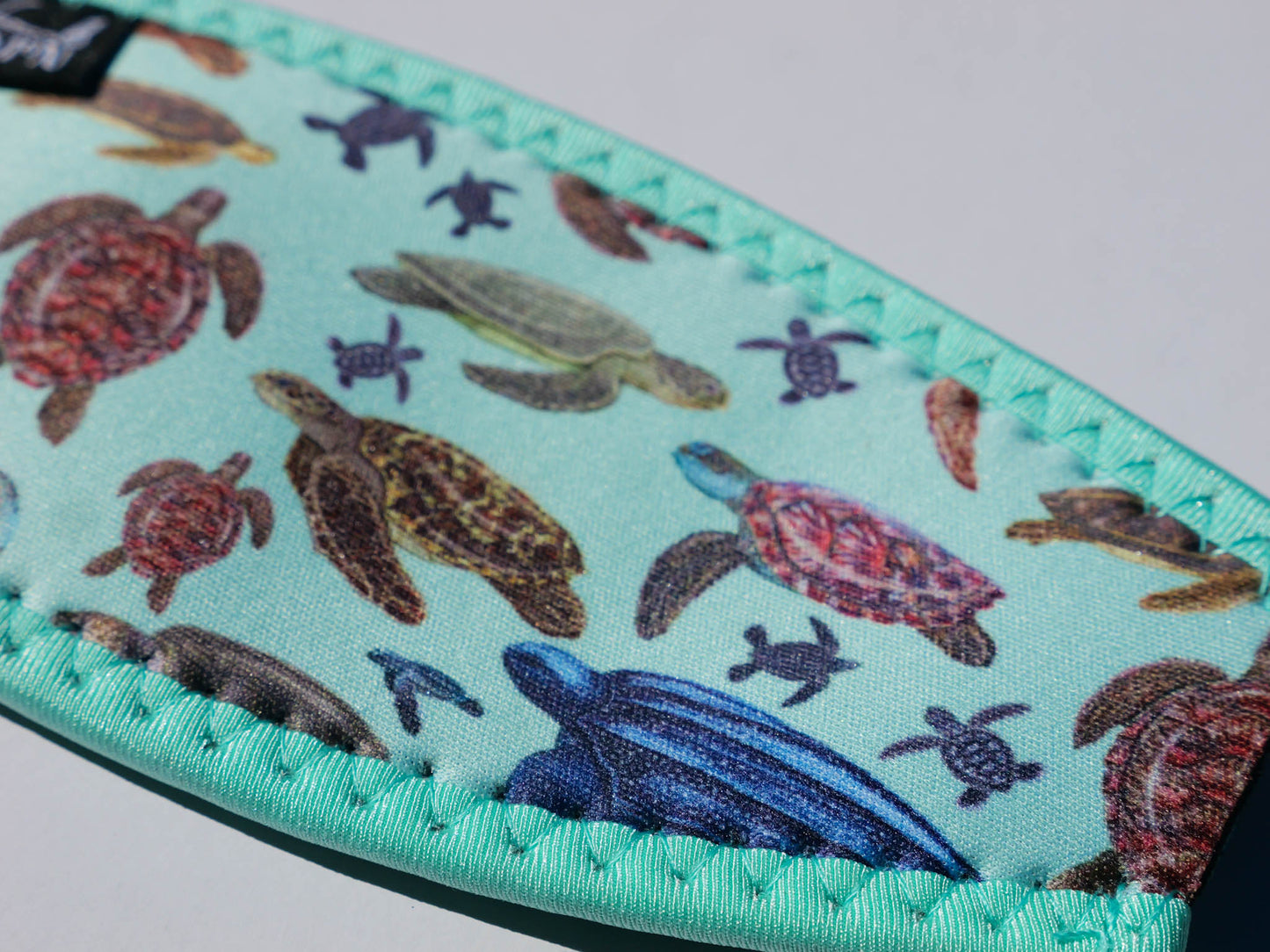 Green turtle mask tamer design shown in great detail close up illustrations by Diver Mon Art