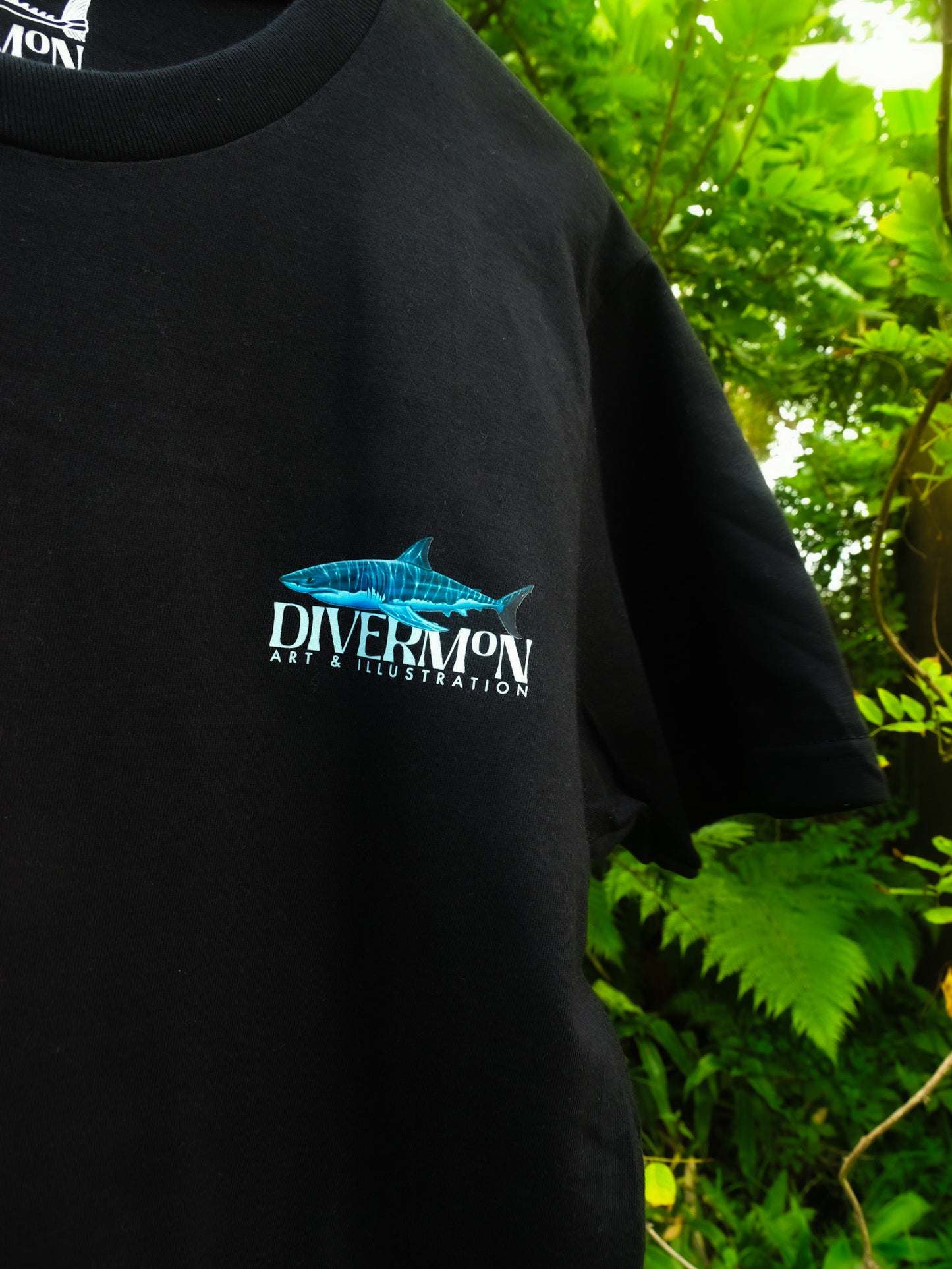 Person wearing Sharks Black t-shirt outdoors by Divermon Art