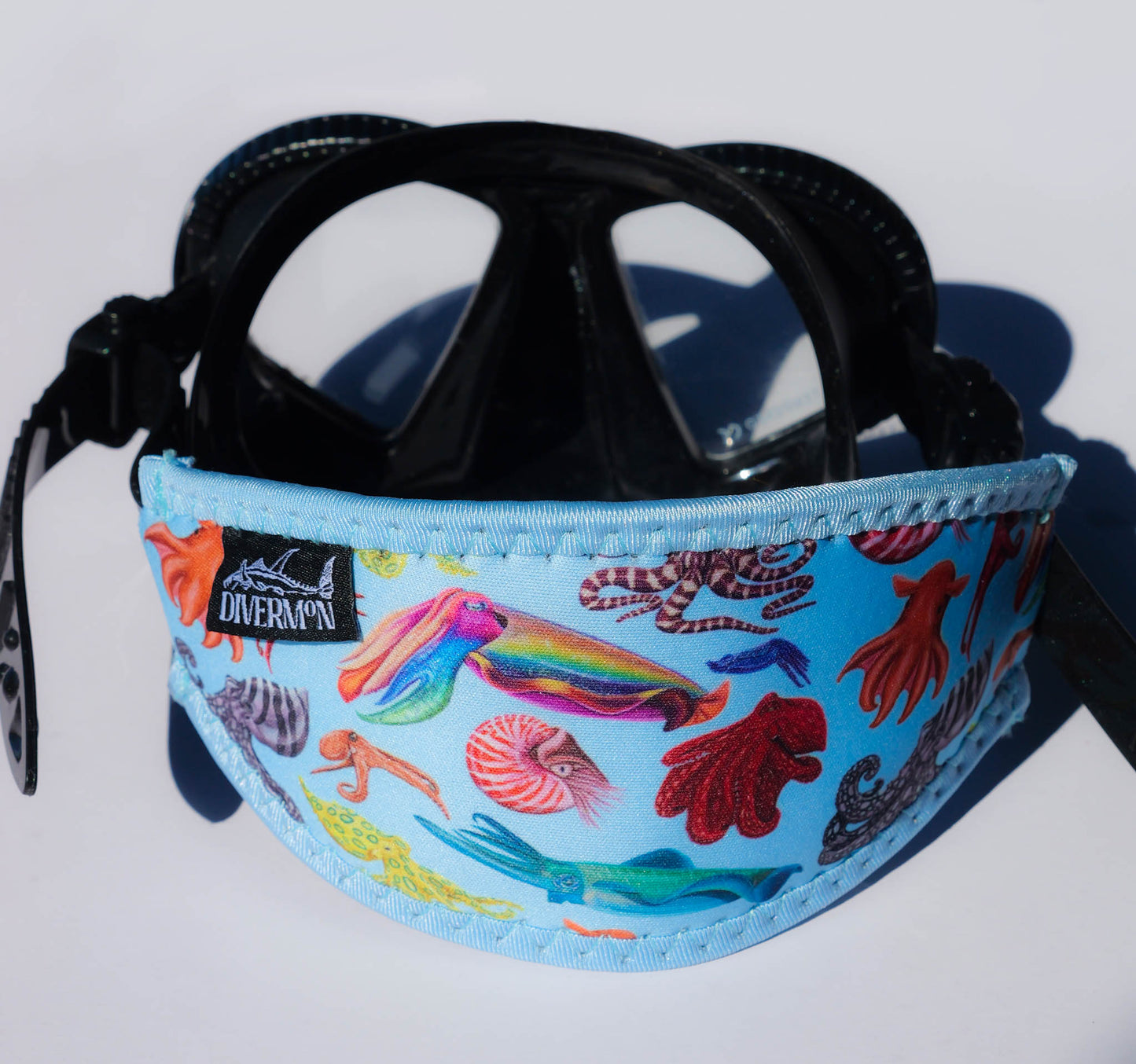 Cephalopod Blue neoprene mask tamer with design by Diver Mon Art shown with mask 