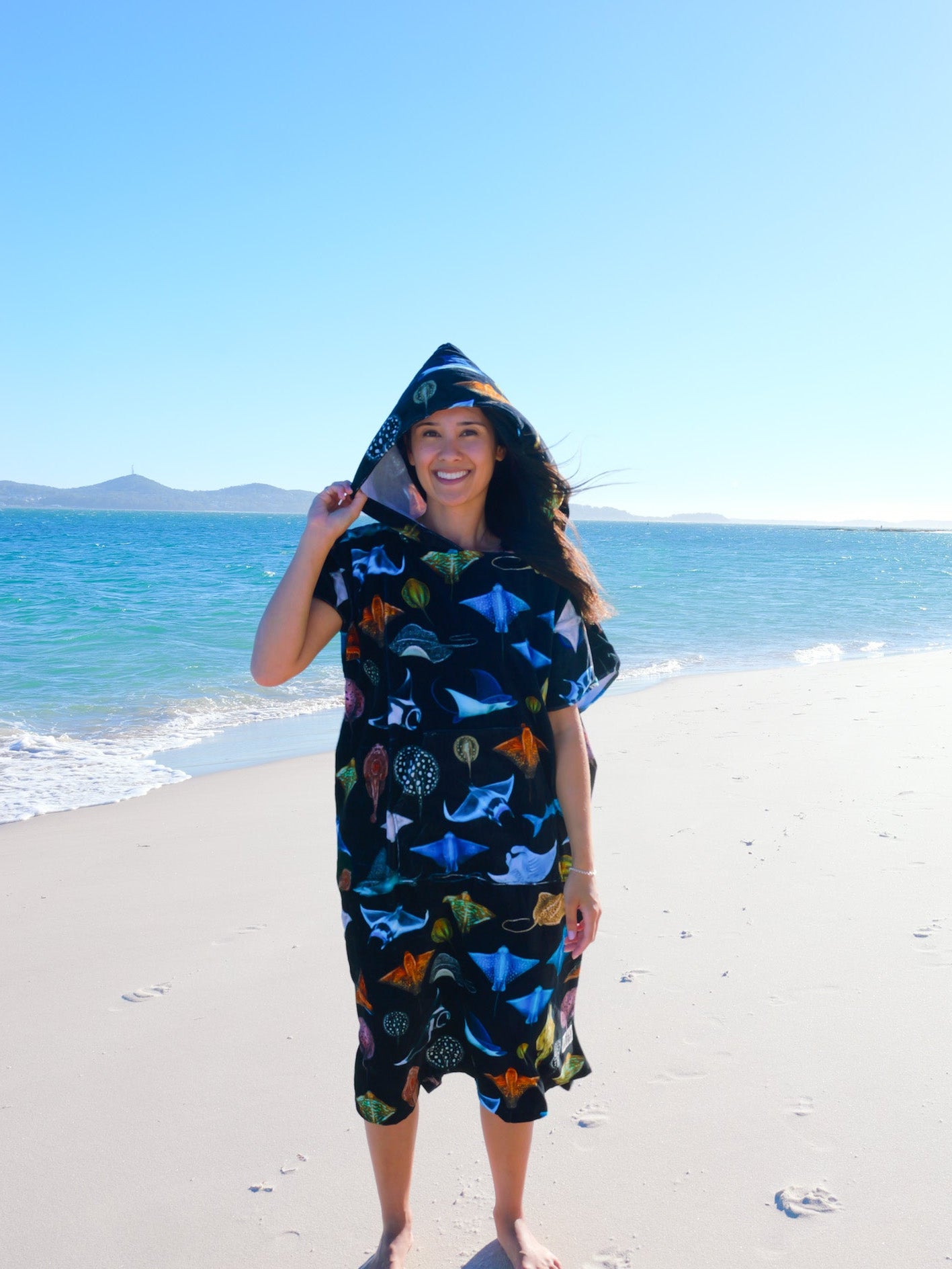 Hooded Cotton Rays XL beach towel folded view Divermon Art marine design