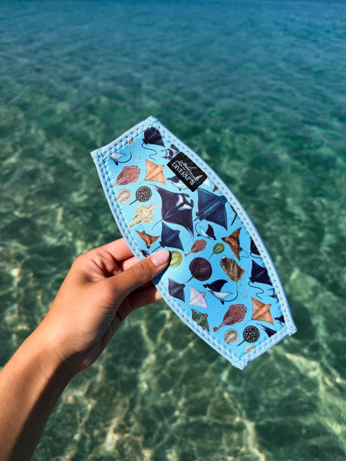 Sting Ray and Manta ray design with a light blue background neoprene mask strap tamer ocean illustration by Diver Mon Art dive hair accessories
