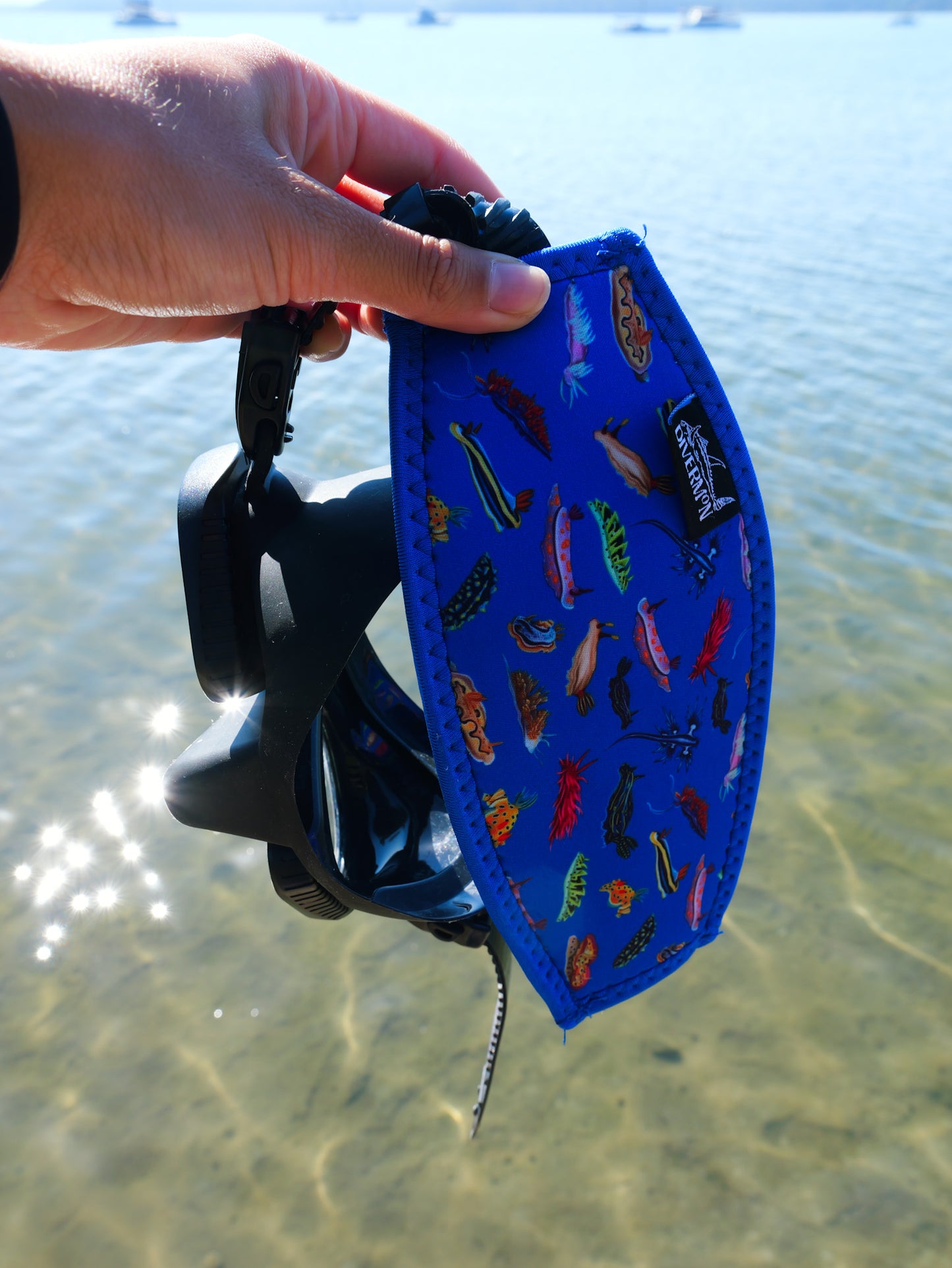 Nudibranch dark blue neoprene mask tamer on a clear water background shown close up in great detail ocean illustration by Diver Mon Art 