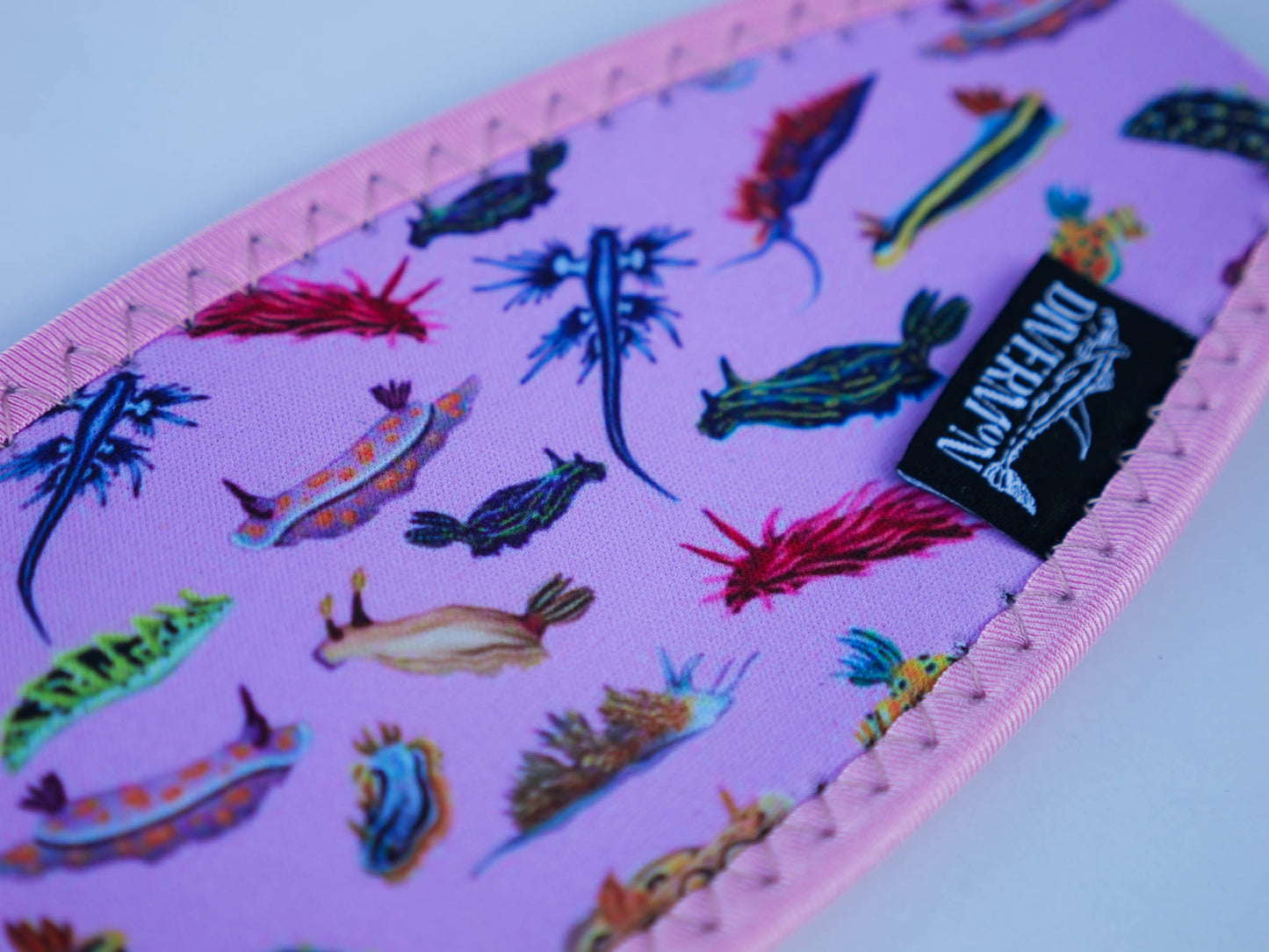 Nudibranch pink mask tamer design shown in great detail close up illustrations by Diver Mon Art  