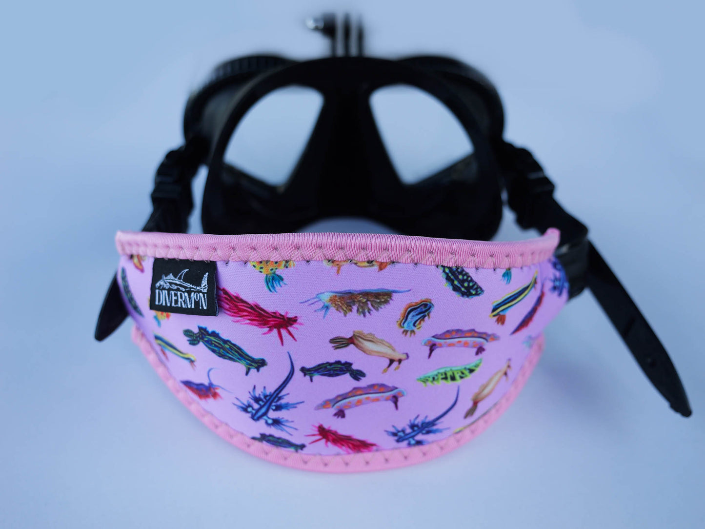 Nudibranch pink neoprene mask tamer ocean illustration by Diver Mon Art shown in great detail with fitted to mask 