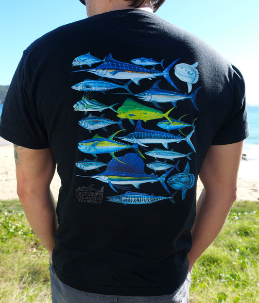 Person wearing a black t-shirt with colorful pelagic fish design outdoors