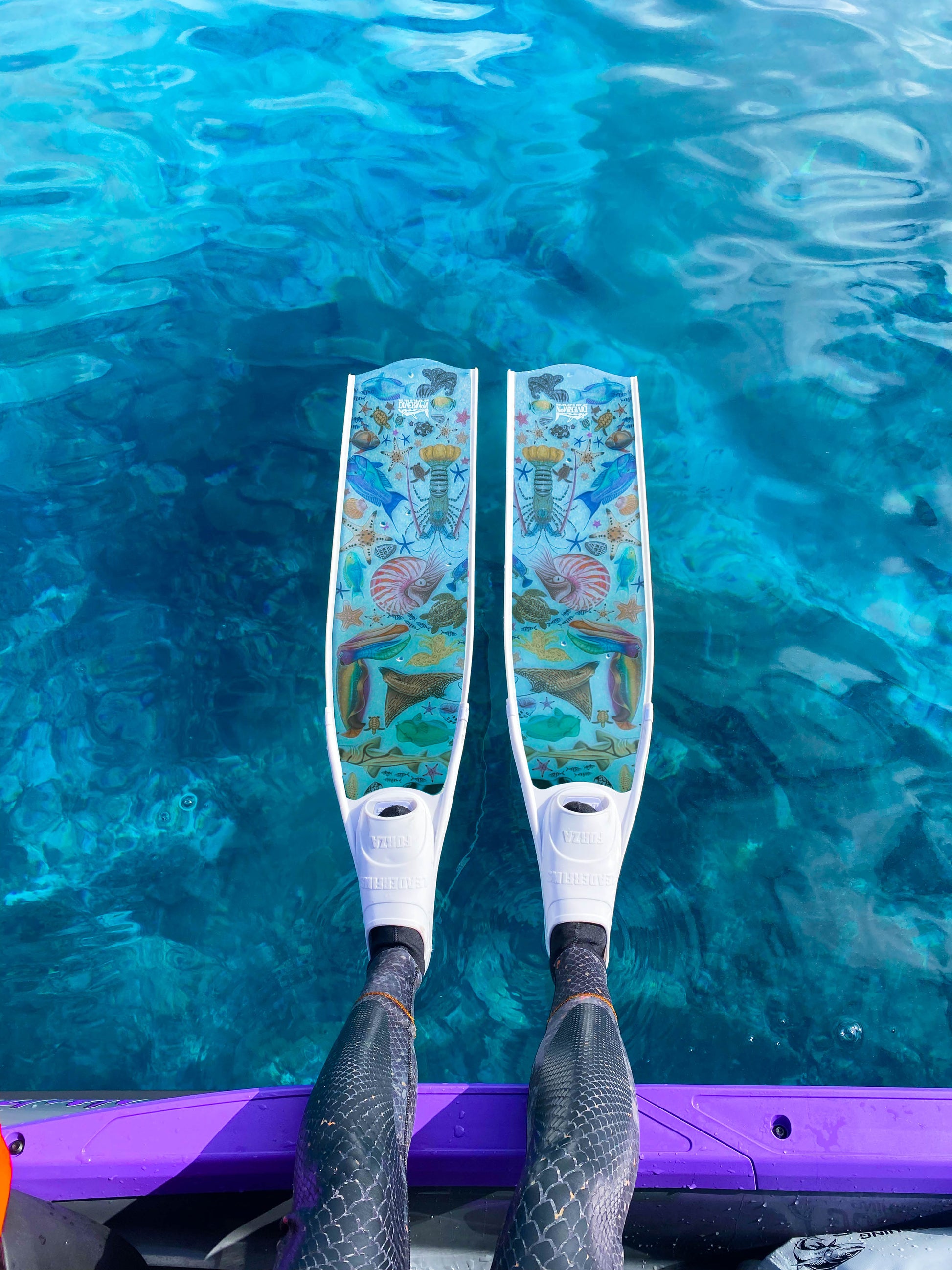 Long blade freediving fins featuring ocean marine life artwork by DiverMon for diving and spearfishing