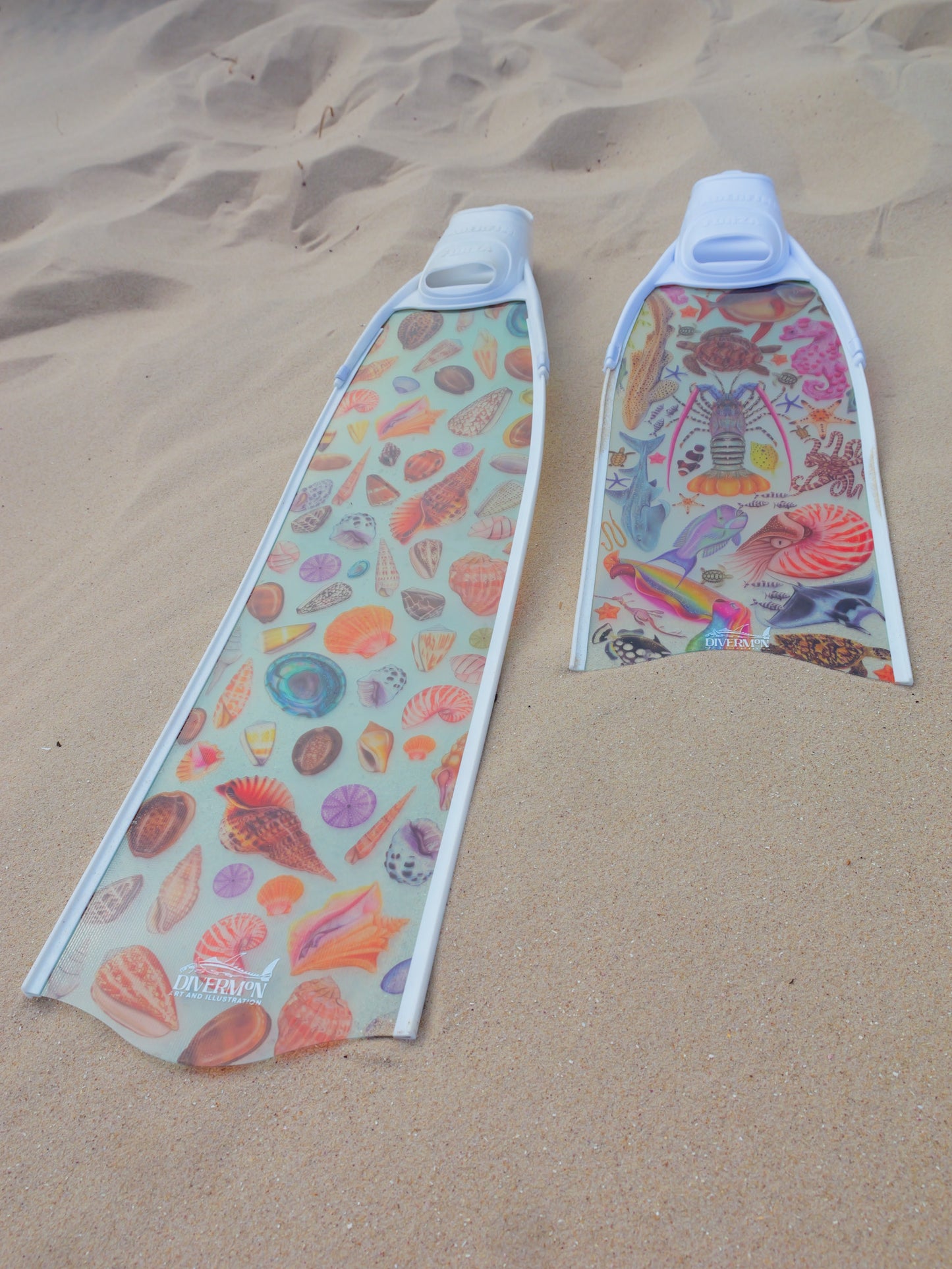 Short freediving fins for travel featuring rainbow ocean design with colourful marine life artwork by DiverMon