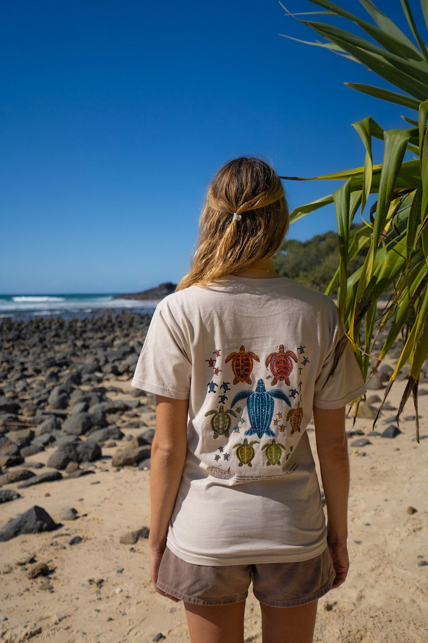 Rear view of tan sea turtle species artwork t shirt by Diver Mon Art marine life clothing tan colour